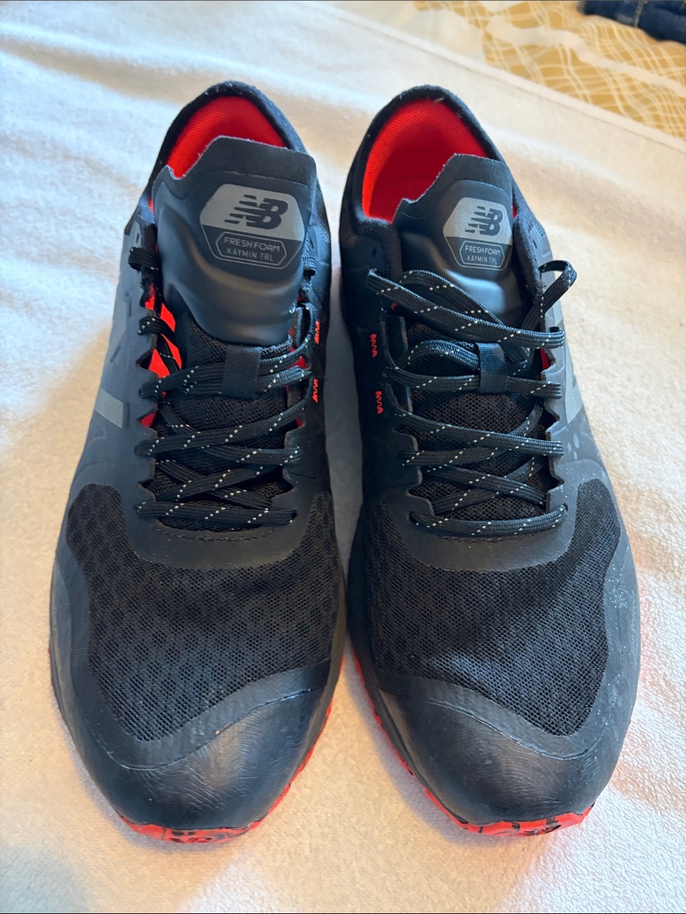 New Balance Men’s Black Athletic Shoes with Red Interior
